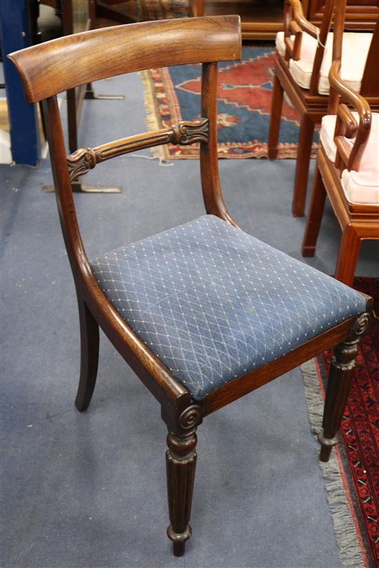 A set of eight rosewood dining chairs
